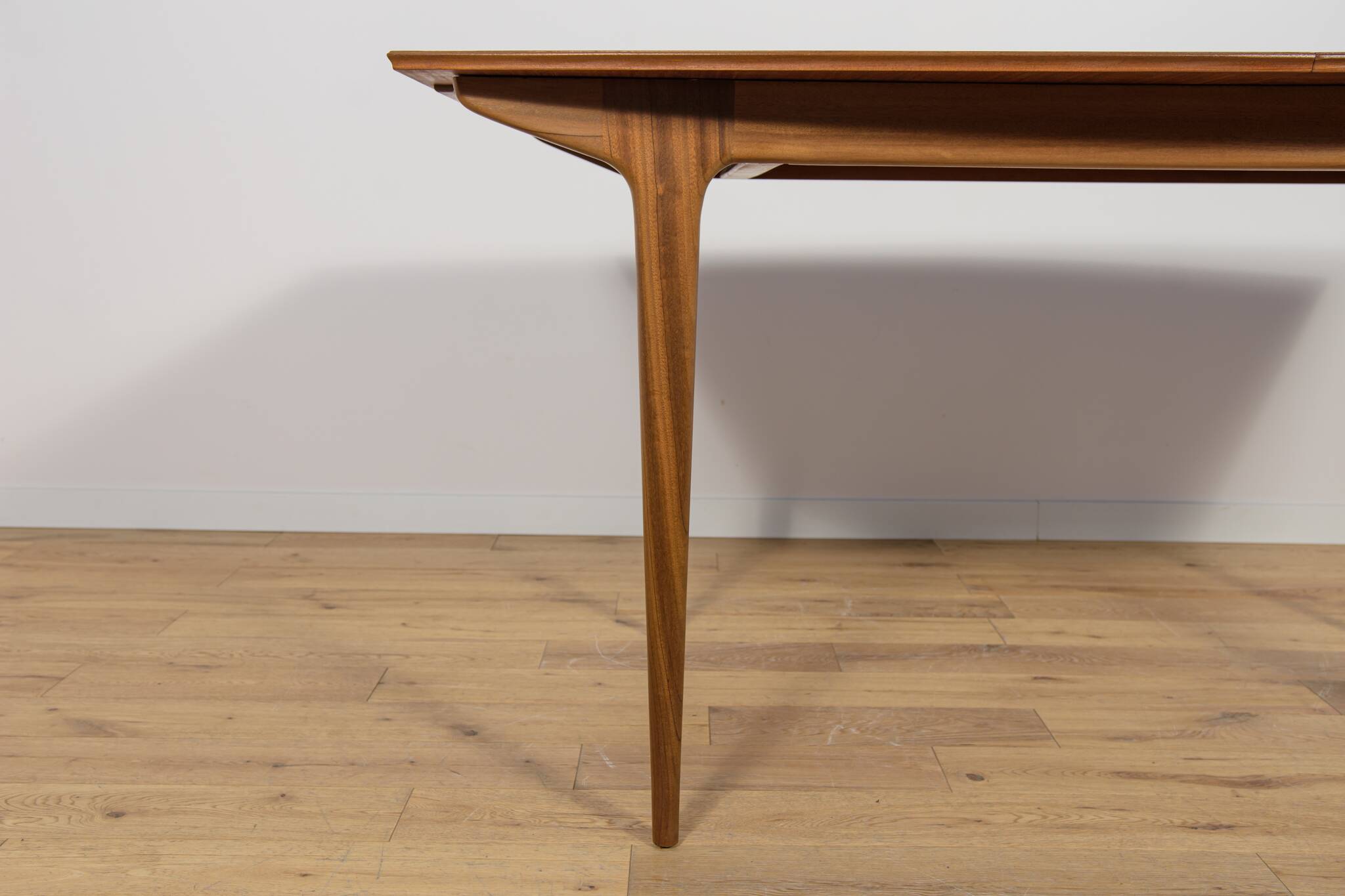 Mid-century teak extending dining table from McIntosh, UK.