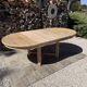 Round solid oak table with extensions, maximum 220cm.
