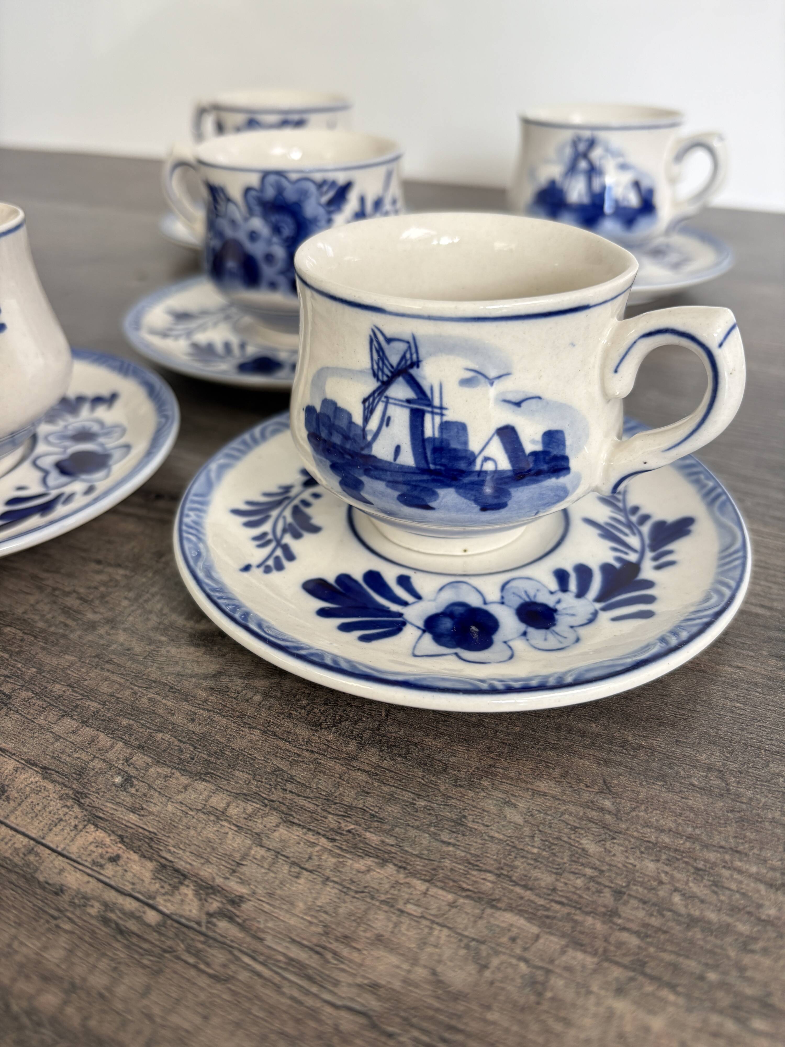 Vintage Dutch Delft Blue earthenware service for 5 cups and saucers.