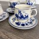 Vintage Dutch Delft Blue earthenware service for 5 cups and saucers.