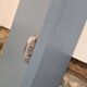 Small Mado 1960 kitchen column unit in yellow formica restyled in blue