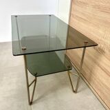 1975 glass coffee table with 2 tops, good condition