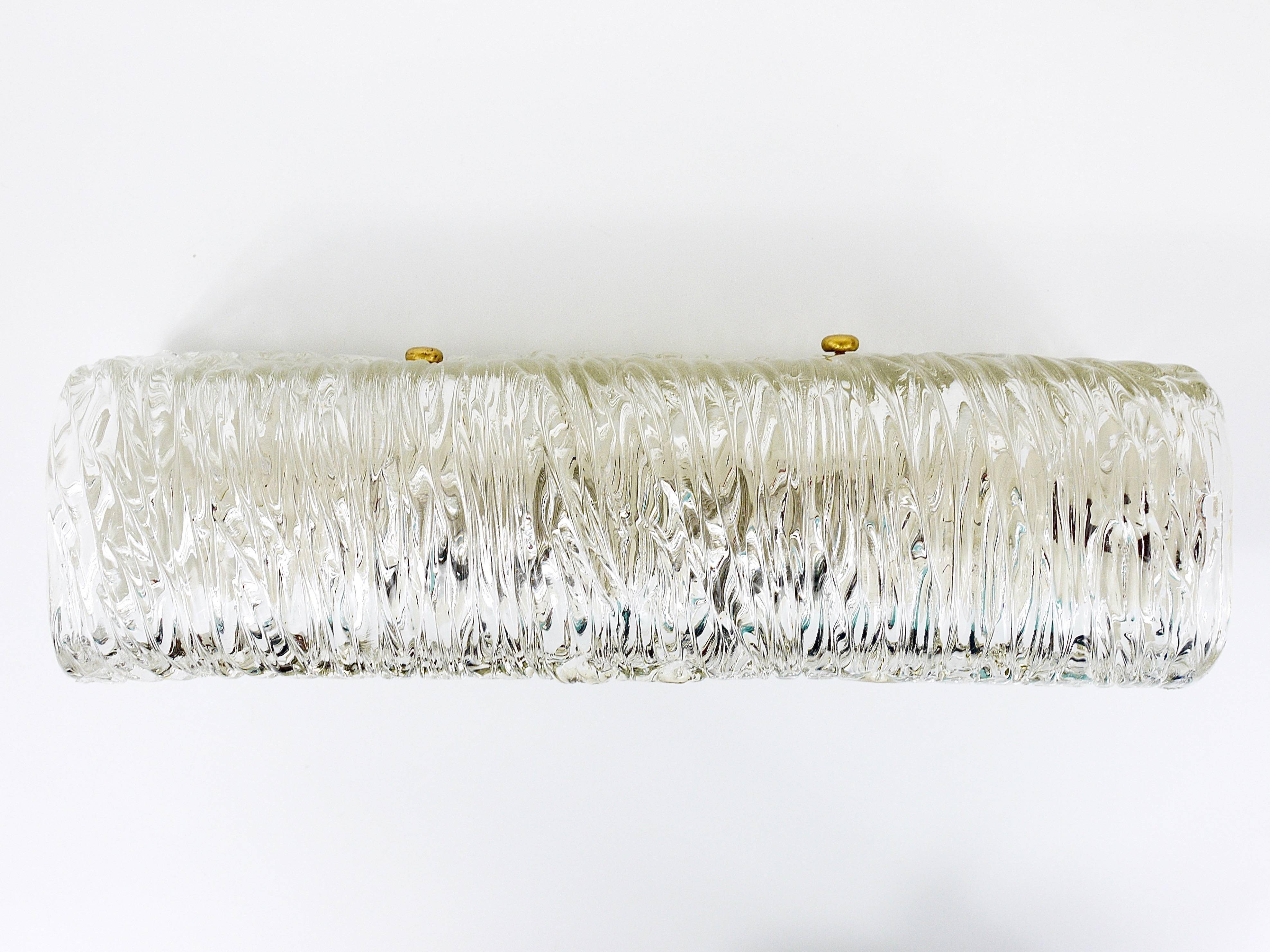 Wall-mounted mirror sconce by J.T. Kalmar, brass and textured glass, Austria, 1950s.