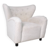 Fauteuil à oreille en bouclette