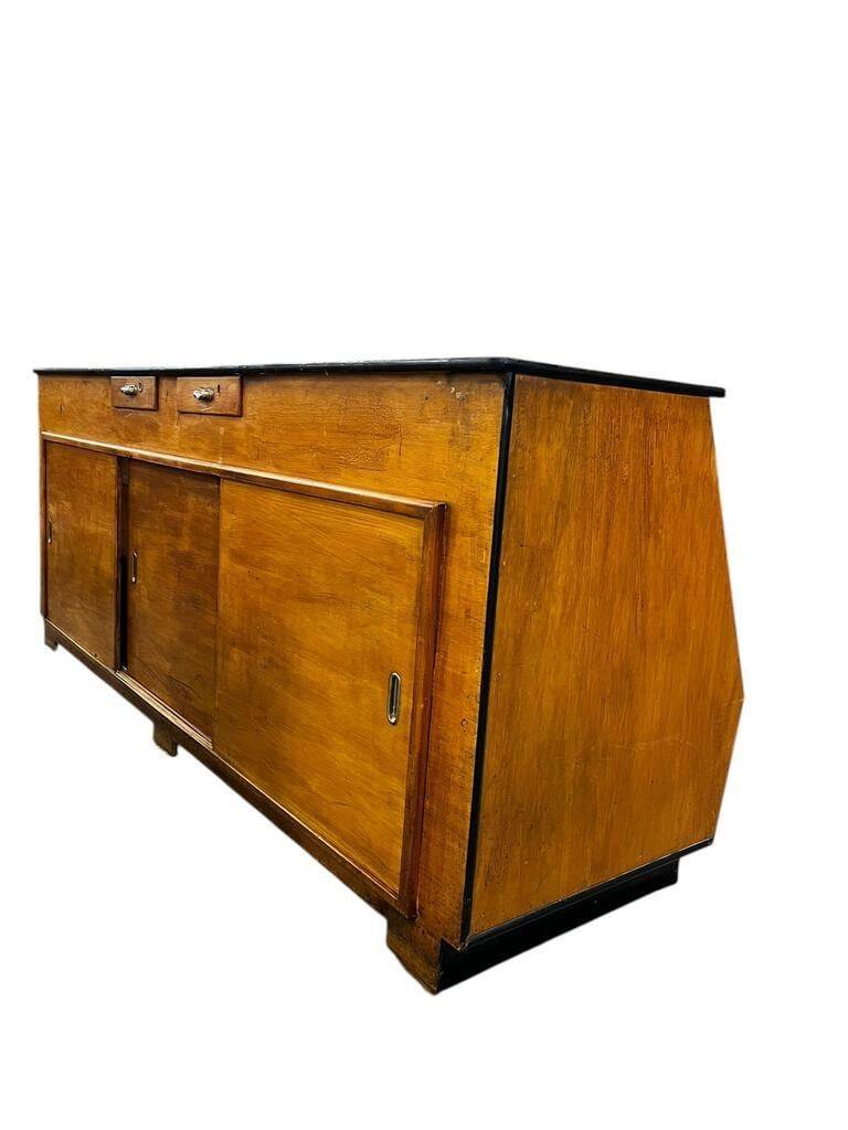 Vintage wooden shop counter with display case