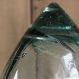 Old blown glass bottle, amphora-shaped