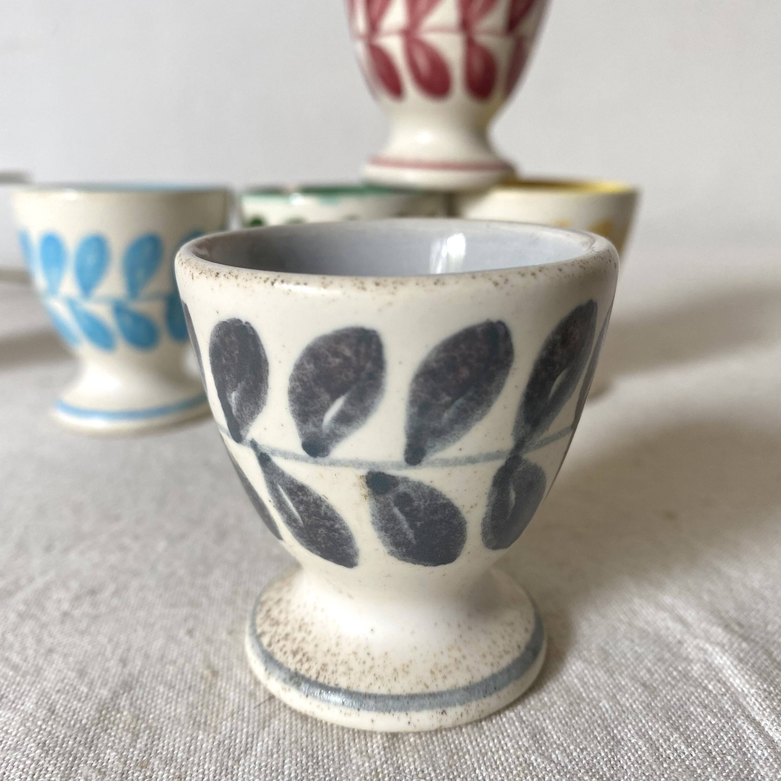 Antique earthenware egg cups