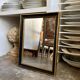 Miroir rectangulaire en bois noir et doré 45 x 35 cm