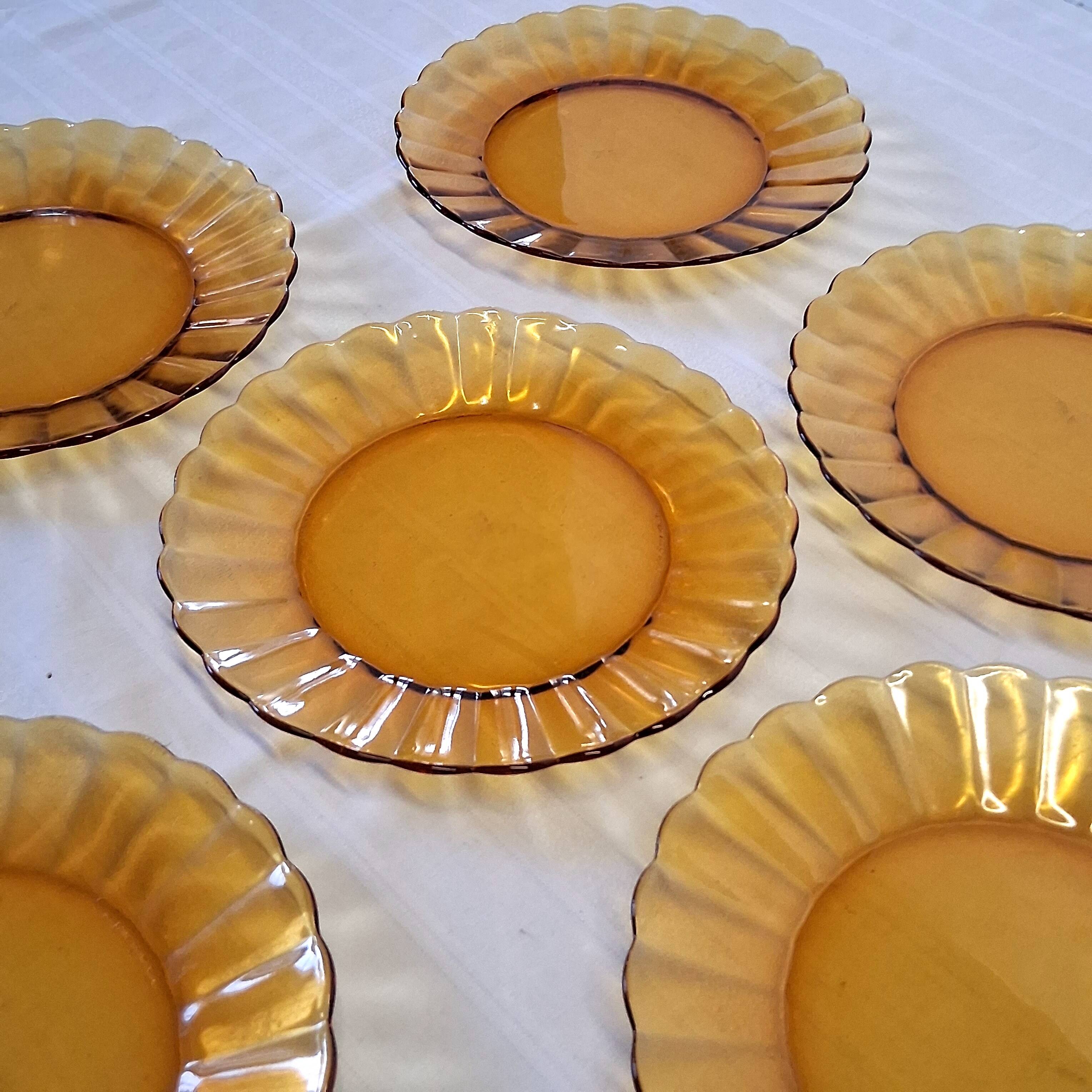 6 Duralex dessert plates in good condition, made of amber-yellow glass