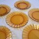 6 Duralex dessert plates in good condition, made of amber-yellow glass