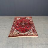 Tapis oriental vintage usé