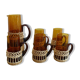 Fruit juice or vintage lemonade service in glass and wicker.