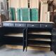 Large wooden and black sideboard