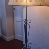 Tripod floor lamp with metal base and skin shade