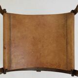 Curule armchair in wrought iron and leather