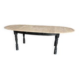 Oval table with integrated extension