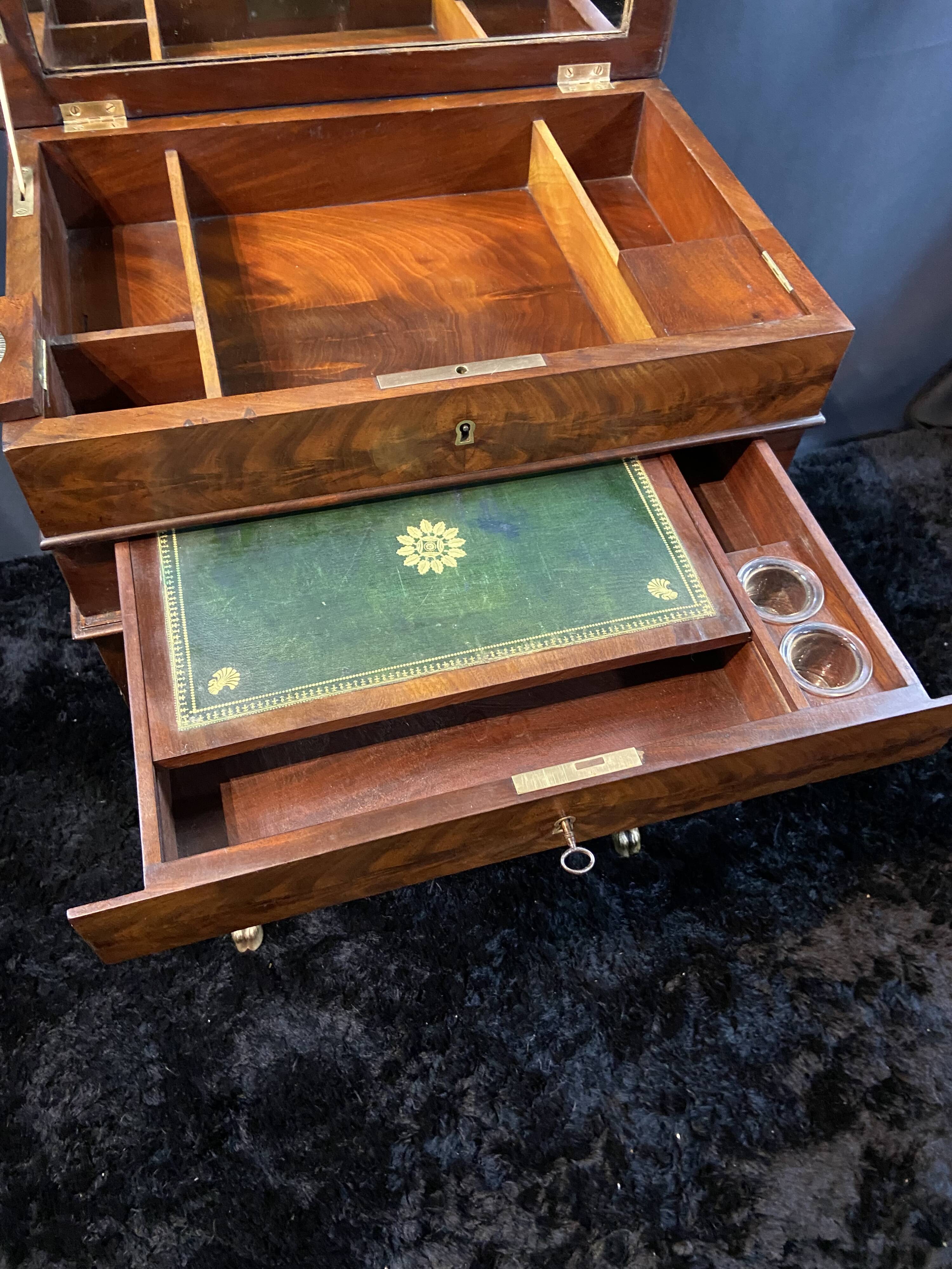 Louis-Philippe period mahogany writing desk with candlestick, 19th century