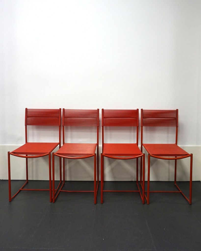 4 chaises rouges Spaghetti de Giandomenico Belotti pour Alias
