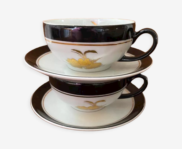 2 tasses sous tasses café en porcelaine blanche et noire.