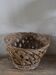 Vintage high round wicker basket with openwork.