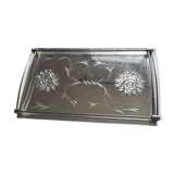Glass top with coplès patterns. Metal surround.