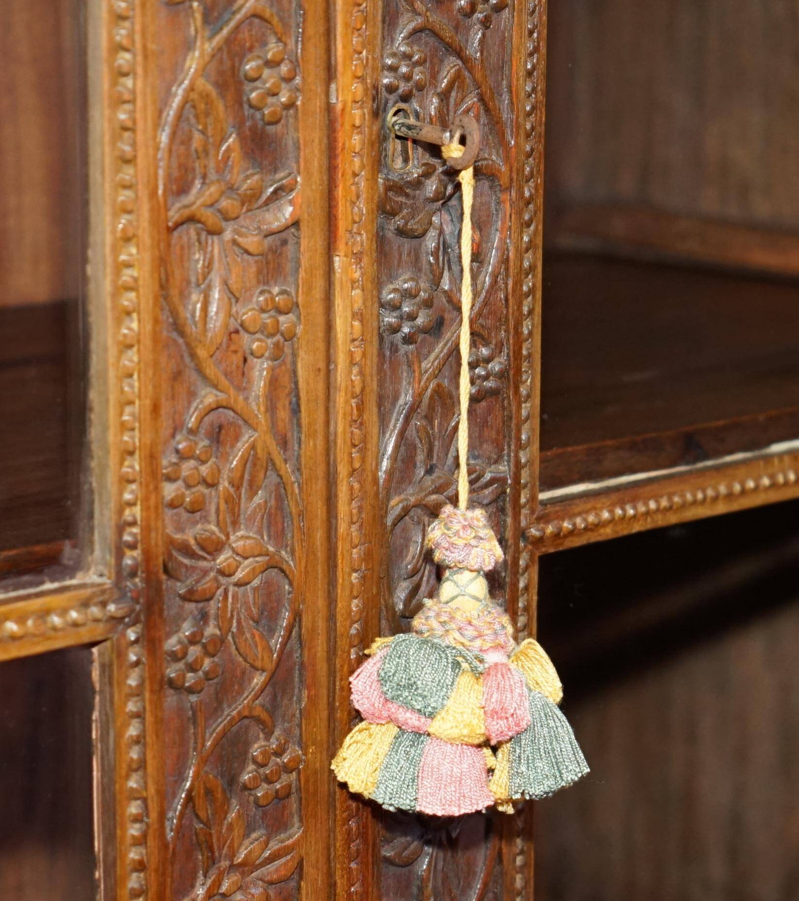 19th-century Anglo-Indian colonial hardwood library on a chest of drawers.