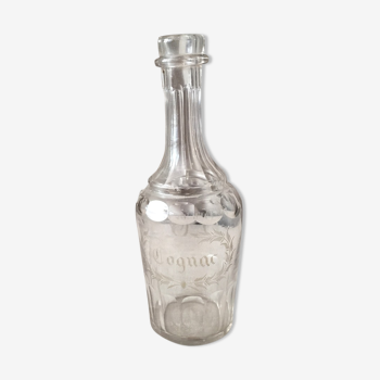 Bottle in gravel glass cognac of the years 1930