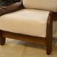 Brutalist pair of armchairs in mahogany and cream boucle 1970s.