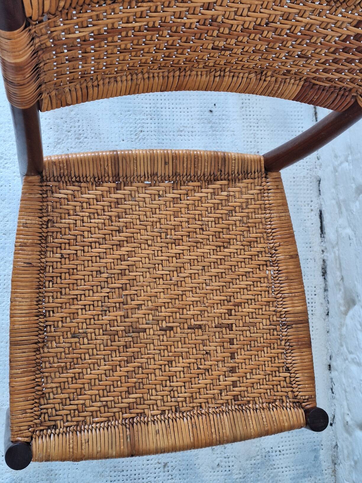 Four teak dining chairs with patinated cane after Gio Ponti, Italy 1960s