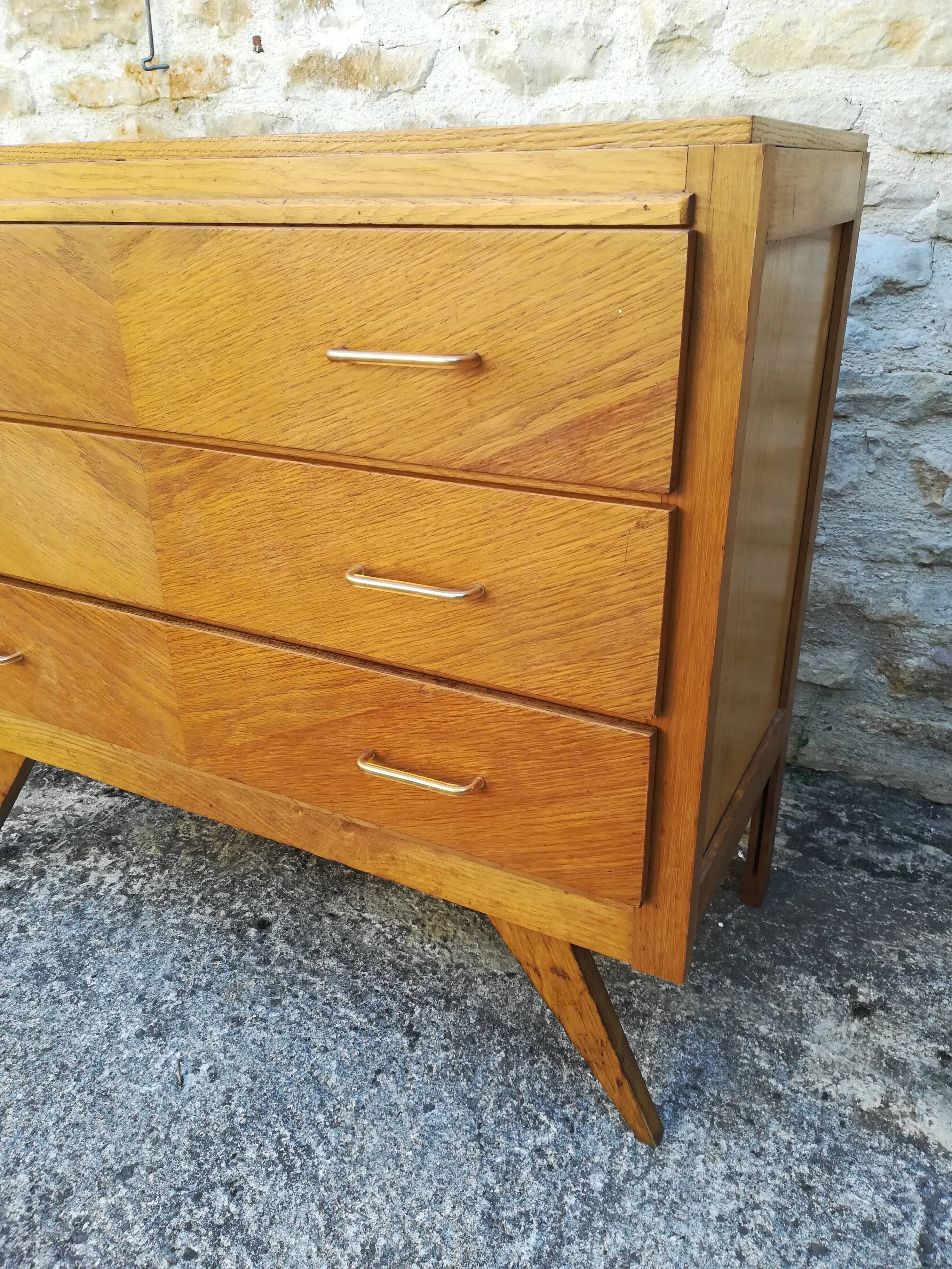 Compass feet chest of drawers