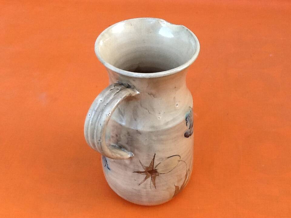 1960s Glazed terracotta pitcher with floral decoration