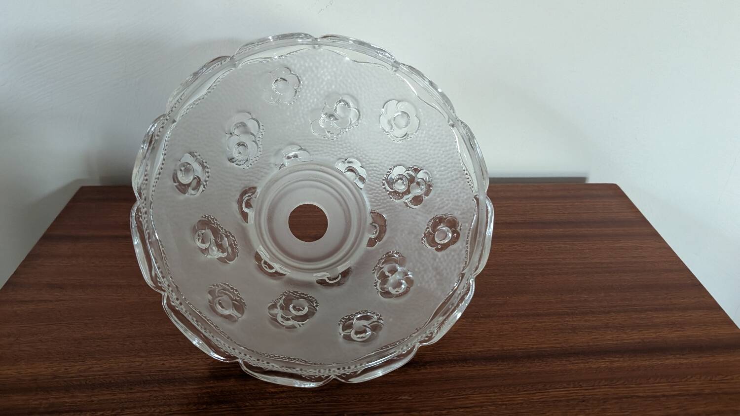 Moulded glass lampshade with floral decoration, granite texture.