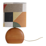 Small carved wooden floor lamp with oval shade