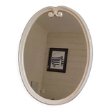 Oval mirror patinated white enamelled metal frame