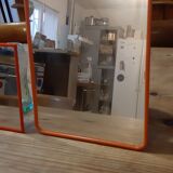 2 vintage plastic orange mirrors