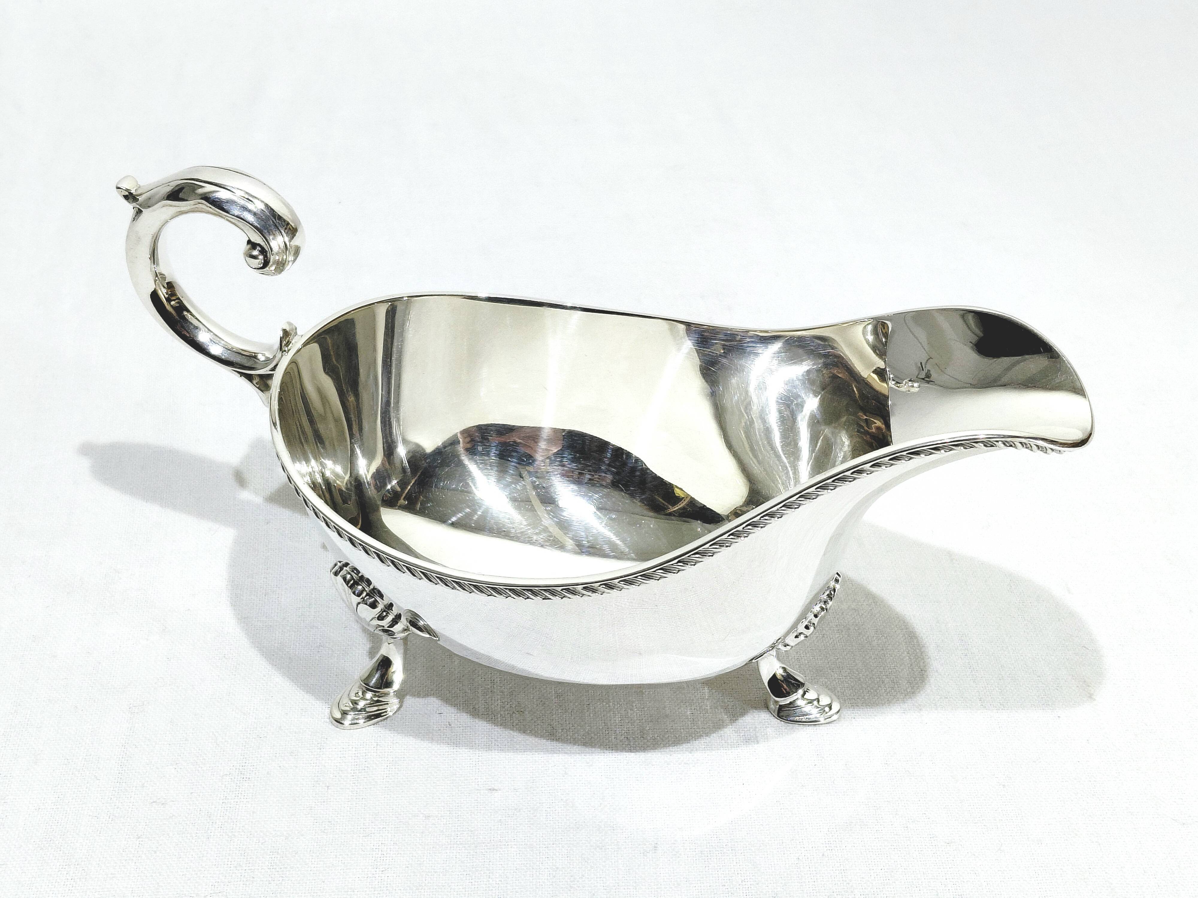 Silver sauceboat, England