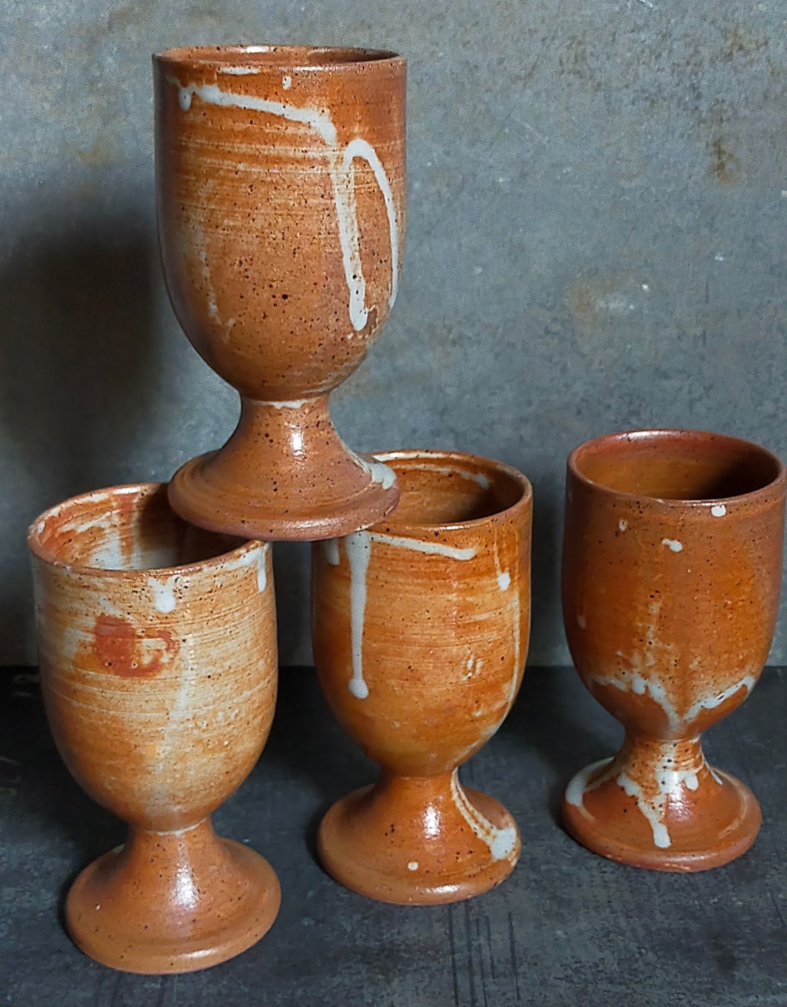 Four potter's mugs turned in vintage light stoneware