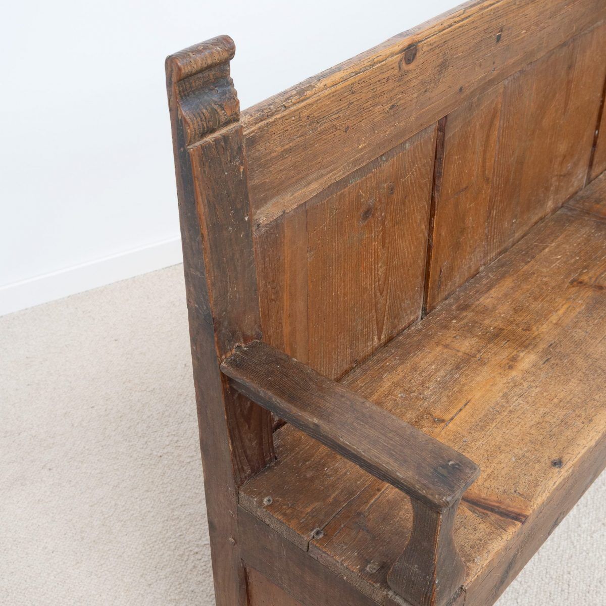 Old wooden bench with panelled backrest – 19th century