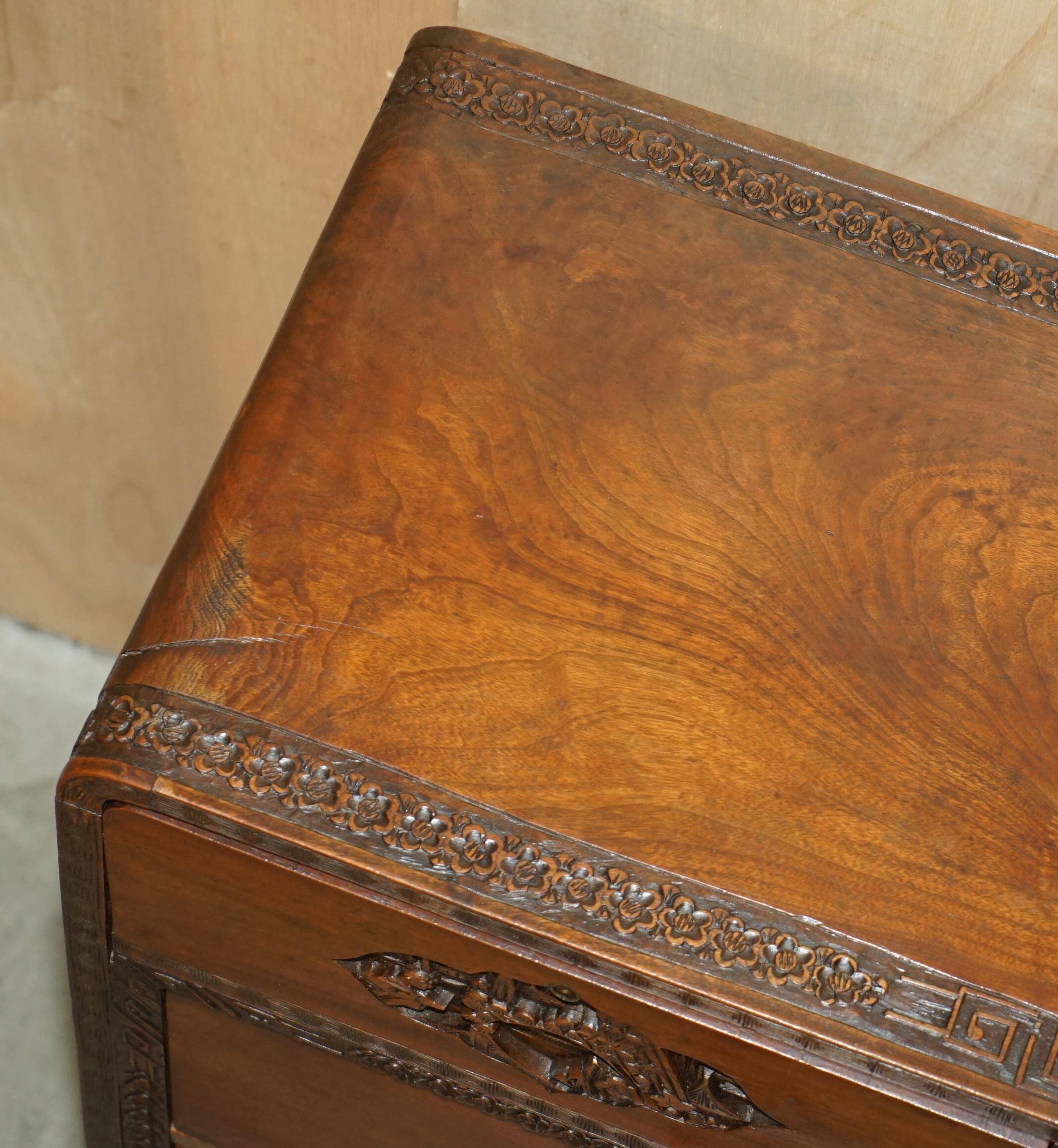 Antique Chinese commode hand-carved circa 1890 with detailed handles.
