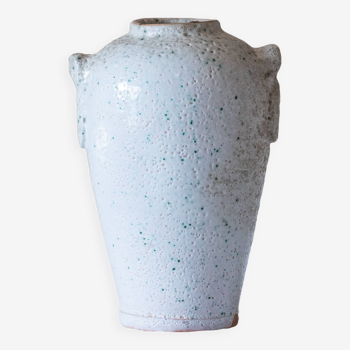 Old foam-glazed terracotta vase