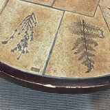 Beech coffee table with a ceramic top featuring a herbarium design.