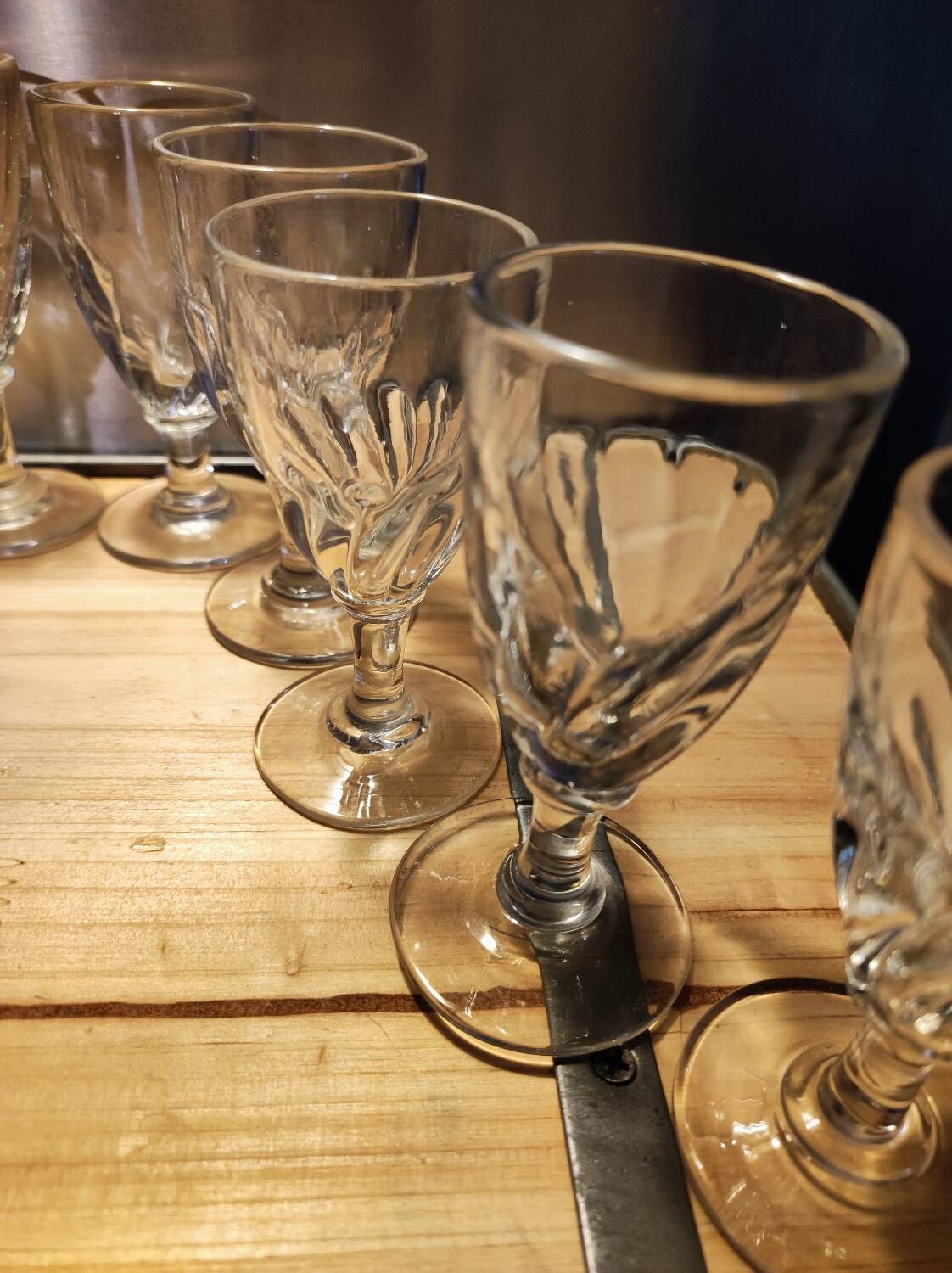 12 small twisted bistro glasses, 19th century