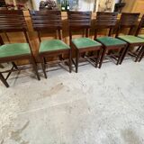 Set of 6 chairs and 2 armchairs by Gaston Poisson