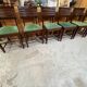 Set of 6 chairs and 2 armchairs by Gaston Poisson