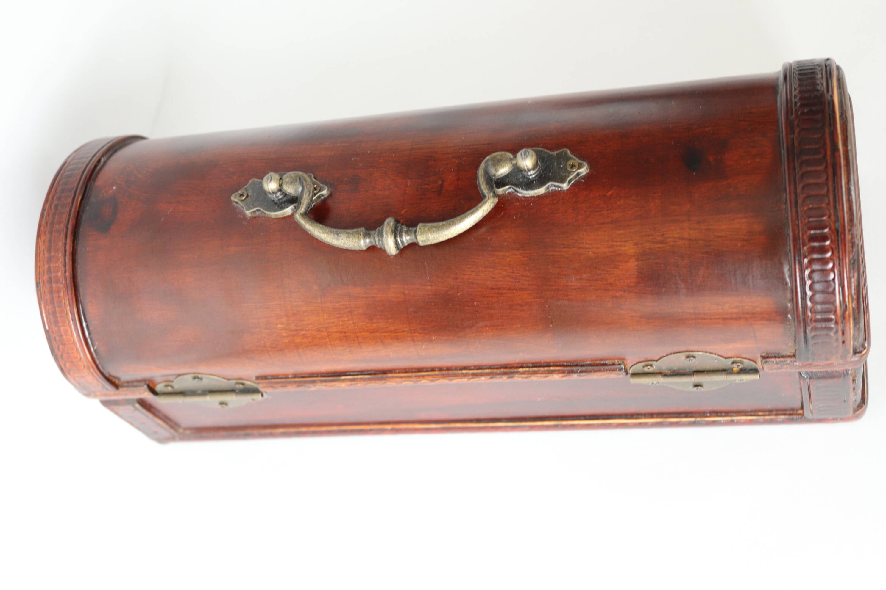 small wooden and brass trunk