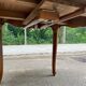 Round extendable dining table Louis XV in solid wood from the 1960s.