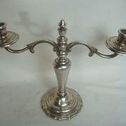 Two-branch silver-plated candle holder from the early twentieth century.