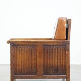 Fauteuil ancien en peau de mouton retapissée