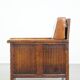 Fauteuil ancien en peau de mouton retapissée