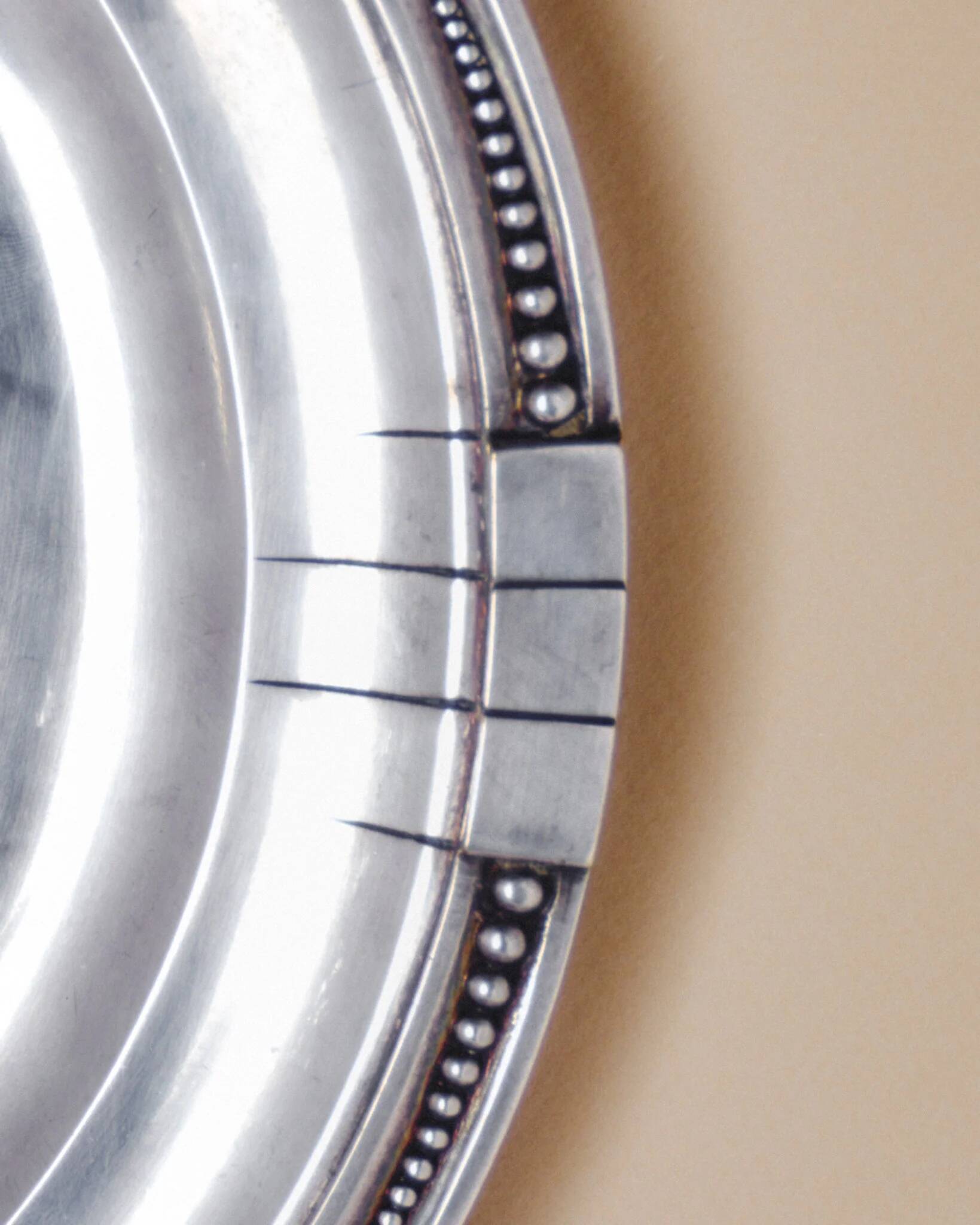 Round silver-plated metal dish, Samuel Askenfeld